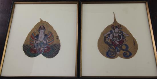 A pair of Chinese paintings on leaves, 20th century, bearing seals for Zhang Daqian, 19cm & 17cm, mounted, framed and glazed